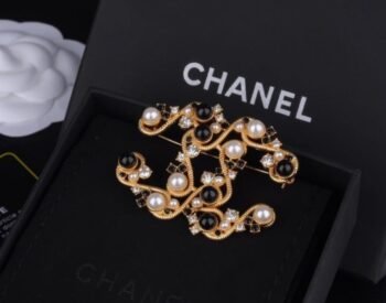 Chanel CC Black and White Pearl Brooch